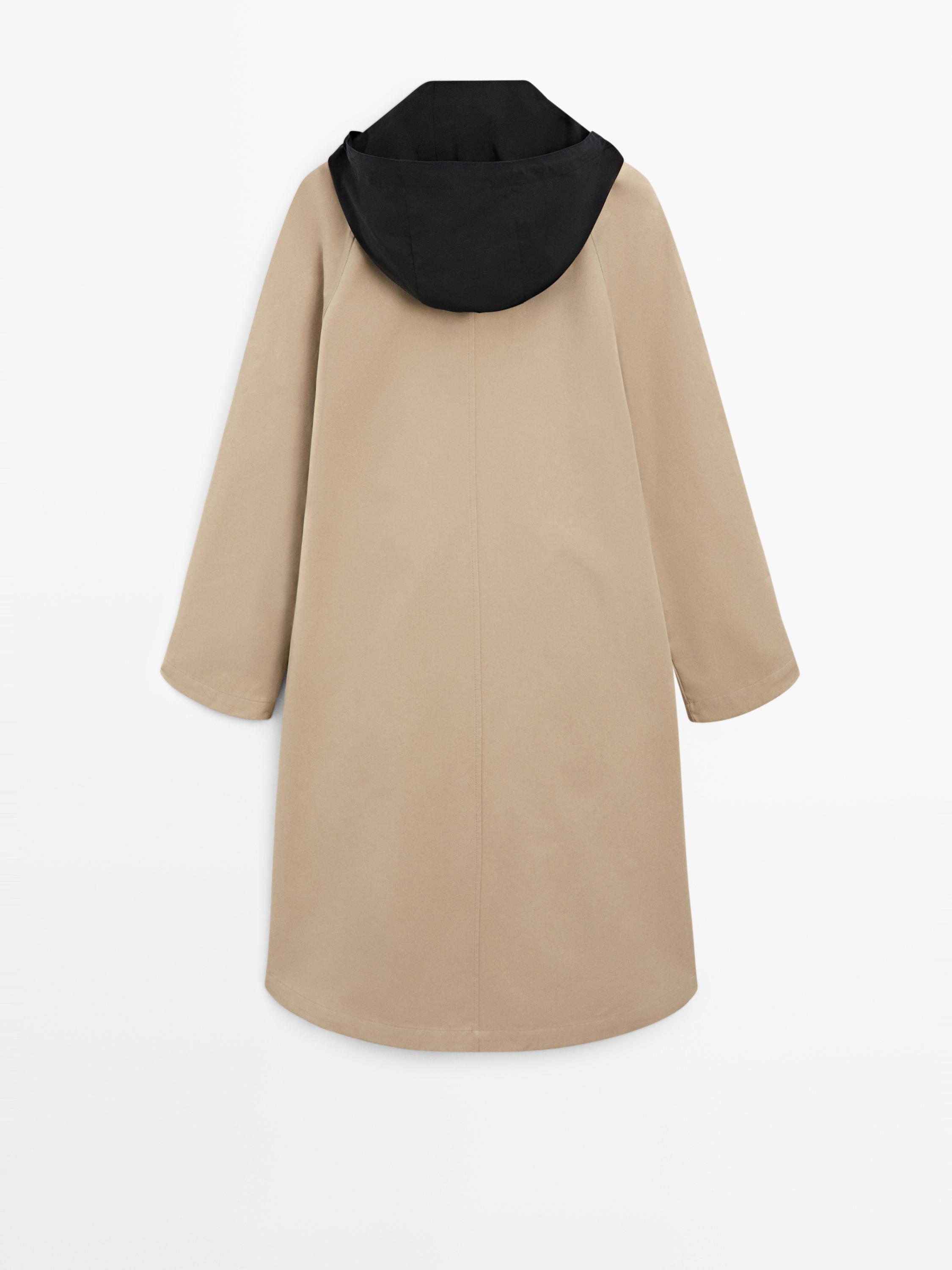 Cape trench coat with detachable hood